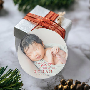 Eerste kerst van de baby ronde sticker