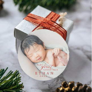 Eerste kerst van de baby ronde sticker