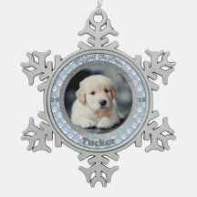 Eerste kerstfoto van puppy met blauwe pootafdruk