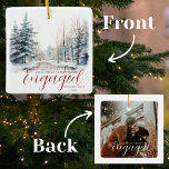 Eerste Kerstmis betrokken 1 foto Waterverf bos Keramisch Ornament<br><div class="desc">Vier uw liefde en de magie van dit speciale seizoen met onze First Christmas Engaged 1 Foto Waterverf Forest Ceramic Ornament. Dit elegante en betoverende ornament vangt de schoonheid van een waterverf winterbos en is de perfecte manier om je verloving te herdenken tijdens de feestdagen. De voorkant van het ornament...</div>