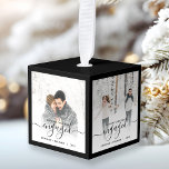 Eerste Kerstmis met vier zwarte foto's Decoratie<br><div class="desc">Herinneer je verloving met dit mooie, moderne keepdoesie ornament. De zwarte tekst staat "Ons eerste kerstfeest bezet", met het woord "verloofd" in elegant handschrift met een bloei voor en na. De bovenkant, de bodem en de randen van de kubus zijn een passende zwarte. Vervang de vier afbeeldingen van de steekproef...</div>