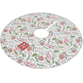 Eerste kerstmonogram in de pekelkegel kerstboom rok (Gekanteld)