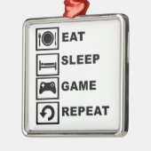 Eet, slaap, spel, herhaal. metalen ornament (Links)