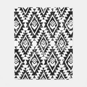 Eetnisch naadloos patroon met een monochrome stam fleece deken