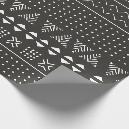 Eetnisch patroon van zwarte en witte stammen met g cadeaupapier (Hoek)