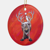 Effectieve rendierziekte op rood en groen keramisch ornament (Links)
