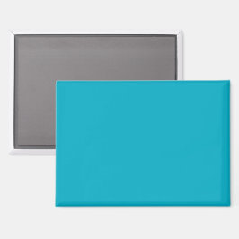 Effen helderblauwe achtergrond met een gladde text magneet