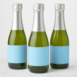 Effen lichtblauwe achtergrond egaal gekleurd sparkling wijnetiket