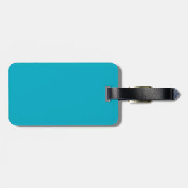 Effen turquoise achtergrond zonder zichtbaar patro bagagelabel