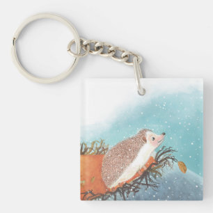 Egel en eerste sneeuwvlokken sleutelhanger