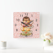 Egel en kleurrijke Teacups op roze wandklok (Huis)