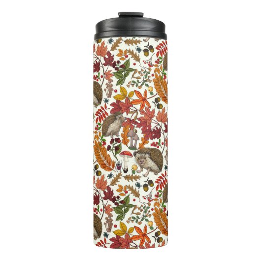 Egels en herfst bosflora op ivoor thermosbeker (Voorkant)