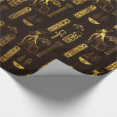 Egyptisch decoratief patroongoud op bruin cadeaupapier (Hoek)