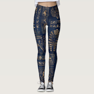Egyptische hiërogliefen en goddelijk goud op marm leggings