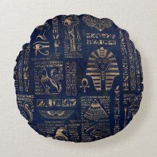 Egyptische hiërogliefen en goddelijk goud op marm rond kussen