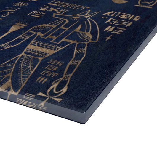 Egyptische hiërogliefen en goddelijk goud op marme snijplank (Hoek)