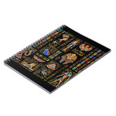 Egyptische hiërogliefen en godheden in zwart notitieboek (Linkerzijde)