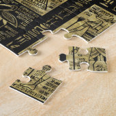 Egyptische hiërogliefen en symbolen op zwart leder legpuzzel (Zijkant)