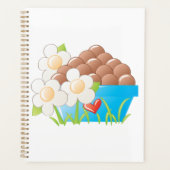 Eieren in blauwe kom met bloemen en hart planner (Voorkant)