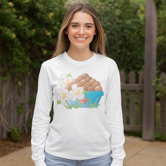 Eieren in blauwe kom met bloemen en hart t-shirt
