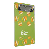 Eieren in bruine mand op groen mini klembord (Schuin)