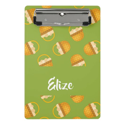 Eieren in bruine mand op groen mini klembord (Voorkant)