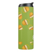 Eieren in bruine mand op groen thermosbeker (Gedraaid links)