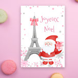 Eiffeltoren en kerstmis in Santa Pink Feestdagen Kaart<br><div class="desc">Deze mooie kerstkaart in Parijs is vol met een roze kerstthema. De Eiffeltoren is gehuld met een schattige roze jongen en een mooie kerstman houdt een zoet roze cadeau vast. De scène is gevuld met vallende roze en zilveren sneeuwvlokken. "Joyeux Noel" is de vakantiegroet die aan de voorzijde van de...</div>