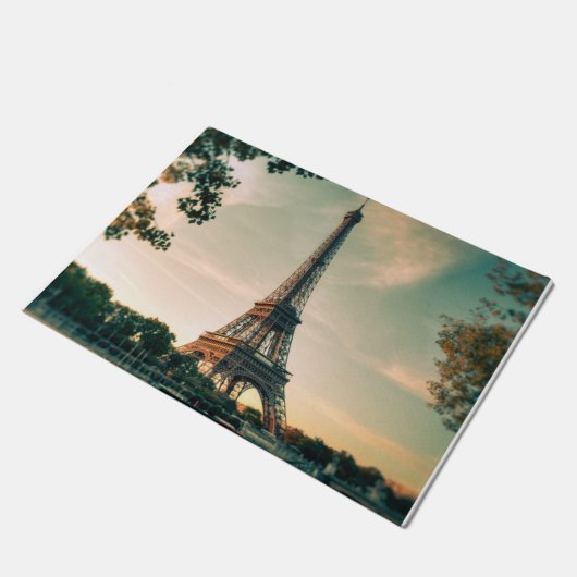 Eiffeltoren werpt kussen op deurmat (Schuin)