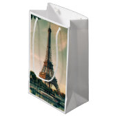 Eiffeltoren werpt kussen op klein cadeauzakje (Voorkant Gekanteld)
