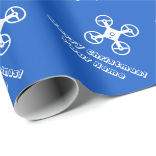 Eigen kerstpapier met dronepiloot cadeaupapier