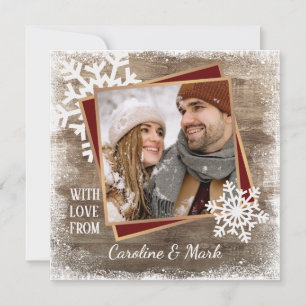 Eigen sneeuwvlokken en houten houten planken feestdagenkaart