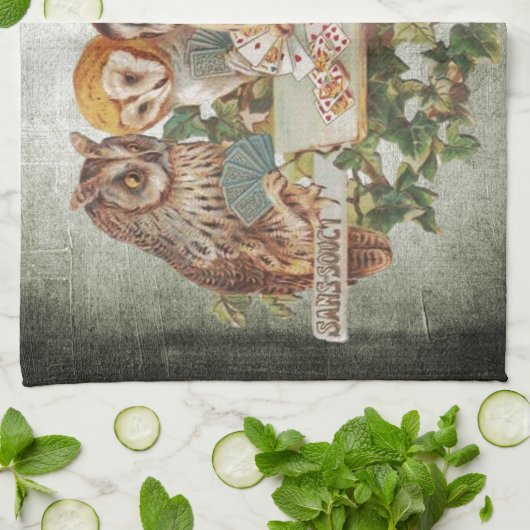 Eigenaars spelen theedoek (Gevouwen)