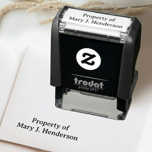 Eigendom van zelfinkende naamstempel  zelfinktende stempel