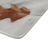 eikenblad op de sneeuw snijplank (Hoek)