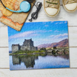 Eilean Donan Castle schotse iconische attracties Legpuzzel<br><div class="desc">Deze puzzel bevat een originele foto van een van de meest iconische kastelen in de Schotse Hooglanden,  het kasteel van Eilean Donan,  die in de wateren van Loch Duich reflecteert</div>