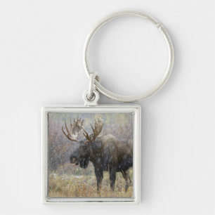 Eland in sneeuwstorm met espbomen sleutelhanger