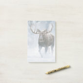 Eland loopt door boreale sneeuw post-it® notes (Op bureau)