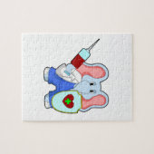 Elefant bij vaccinatie met spuit legpuzzel (Horizontaal)