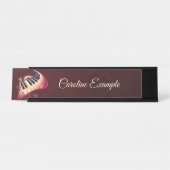 Elegance in motion, the curved piano. bureau naambordje (Voorkant)