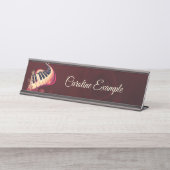 Elegance in motion, the curved piano. bureau naambordje (Voorkant)