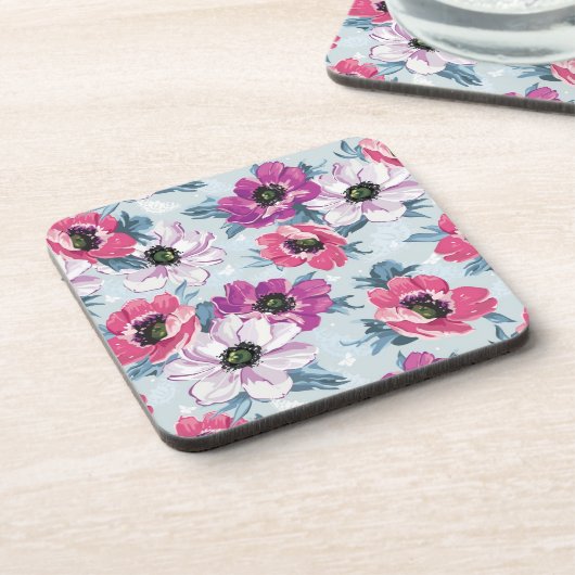 Elegance kleurenbloemen patroon op blauw drankjes onderzetter (Linkerzijde)