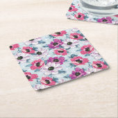 Elegance kleurenbloemen patroon op blauw kartonnen onderzetters (Schuin)