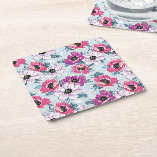 Elegance kleurenbloemen patroon op blauw kartonnen onderzetters (Schuin)