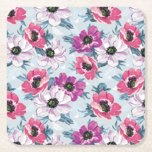 Elegance kleurenbloemen patroon op blauw kartonnen onderzetters