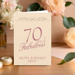 Elegant 70 en Fabulous Ornament 70th Birthday Kaart<br><div class="desc">Elegant 70 en Fabulous Ornament 70ste verjaardag Kaart. 70 en prachtige tekst in trendy gouden script en een elegant ornament op champagne achtergrond. Personaliseer het met jouw naam en uw leeftijd,  en maak gepersonaliseerde elegante verjaardagskaart. Voeg je verjaardagsbriefje toe aan de kaart of wis het.</div>