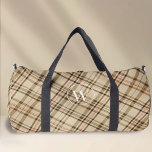 Elegant beige geruite patroon monogram plunjezak<br><div class="desc">Introductie van de Plaid Pattern Monogram Duffel Bag ontworpen door PixeliaDesigns, waar mode voldoet aan praktisch nut. Deze duffel heeft een tijdloos geruite vormgeving in ingetogen beige tinten en is verhoogd met een aangepast monogram in een geavanceerd lettertype, dat zowel geschikt is voor mannen als voor vrouwen. Perfect voor een...</div>
