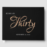 Elegant Black en Gold 30th Birthday Gastenboek<br><div class="desc">Dit ontwerp van het 30e verjaardagsgastenboek is zeer elegante bedankt aan het opvallende gouden manuscript dat tegen de klassieke zwarte achtergrond wordt geschreven. Je kunt de cover personaliseren door de naam van het verjaardagsmeisje en de datum van haar feest toe te voegen. Onze aangepaste gastboeken zijn een prachtige manier voor...</div>