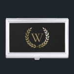 Elegant Black Gold Laurel Wreater Monogram Visitekaarthouder<br><div class="desc">Dit elegante visitekaartje hoesje bevat uw monogram in faux goud dat is omgeven door een bijbehorende goudlaurel op een zwarte achtergrond. Ontworpen door Susan Coffey.</div>