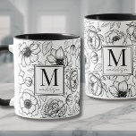 Elegant Black White Monogram Mok<br><div class="desc">Vier de speciale vrouw in je leven met deze stijlvolle en verfijnde monogram mok, ontworpen om een vleugje elegantie te brengen in haar dagelijkse routine. Met een chique zwart-wit bloemmotief dat doet denken aan hoge mode en luxemerken, combineert deze mok een modieus ontwerp met een tijdloze stijl. Het meisjesachtige ontwerp...</div>
